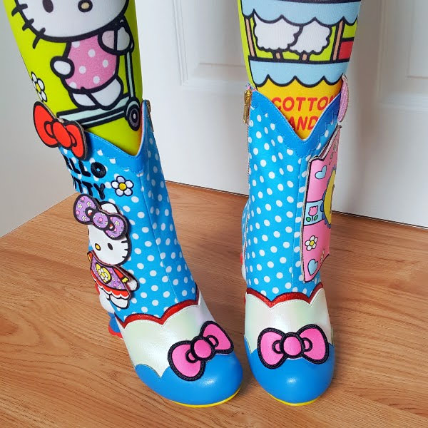 wearing Hello Kitty patterned tights and matching boots