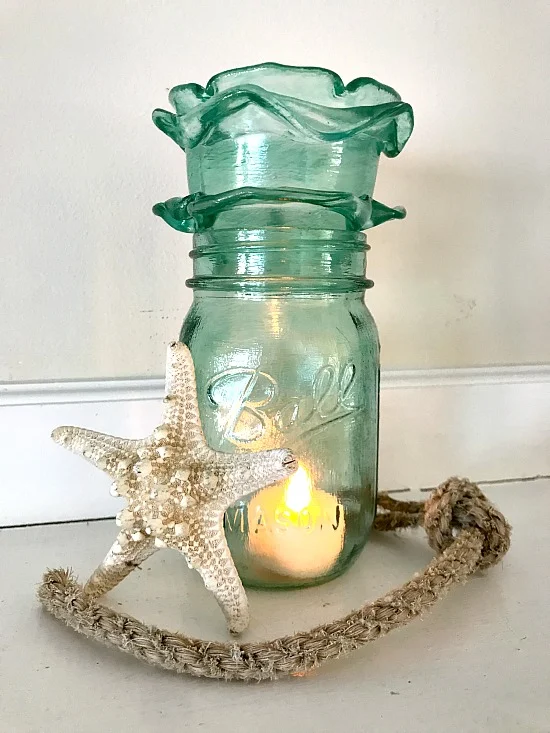 Blue frosted Mason Jar candle holder and starfish