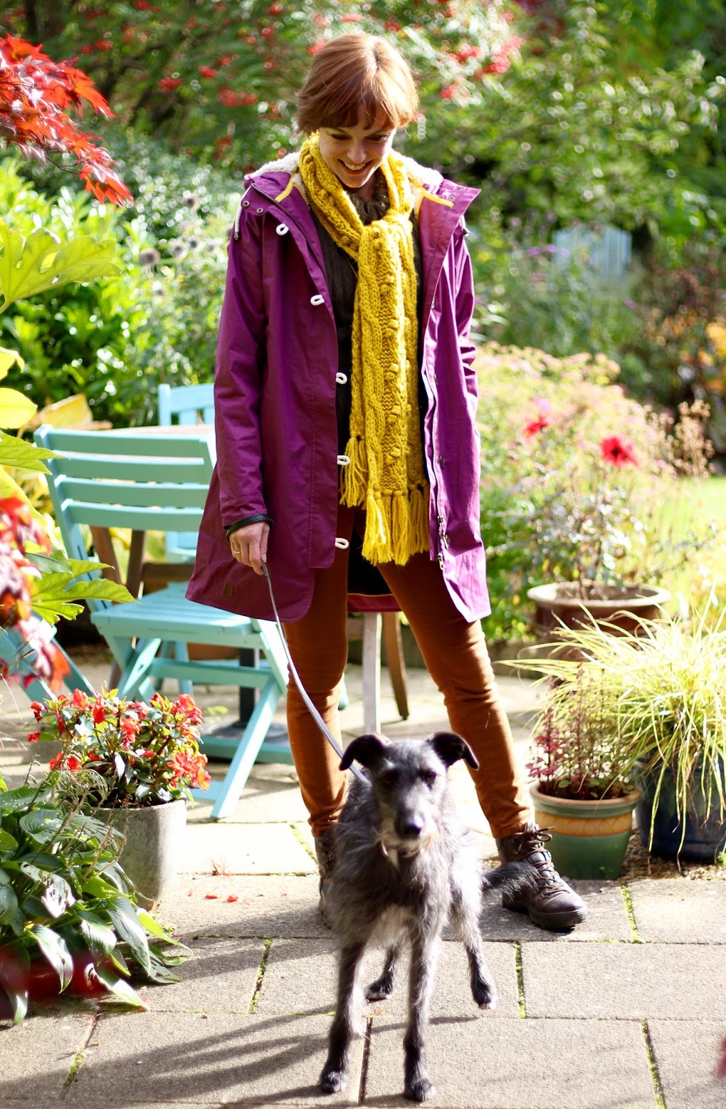 Fake Fabulous | Plum waterproof lighthouse coat, tobacco jeans, yellow scarf and walking boots.