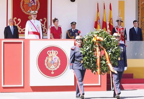 Queen Letizia wore a new crepe midi Suzie dress by Cherubina which is a Seville based Spanish fashion brand