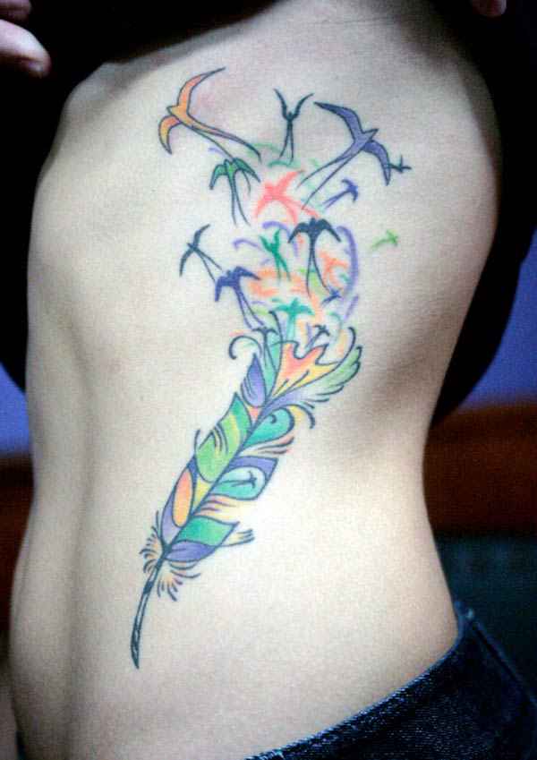 That is so beautiful, colorful feather tattoo design ideas feather turning into birds