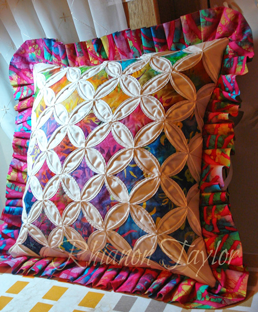 Cathedral Window Patchwork Pillow Free Tutorial designed by Rhianon Taylor of National Quilters Circle