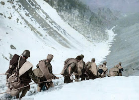 Troops fleeing across the Pyrenees in March 1938 worldwartwo.filminspector.com