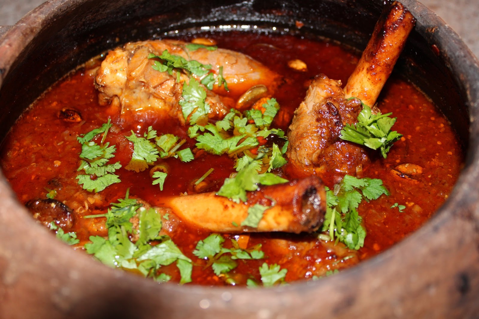 FLOWER POT KITCHEN MADRAS LAMB SHANK CURRY COOKED IN WOOD FIRED CLAY OVEN