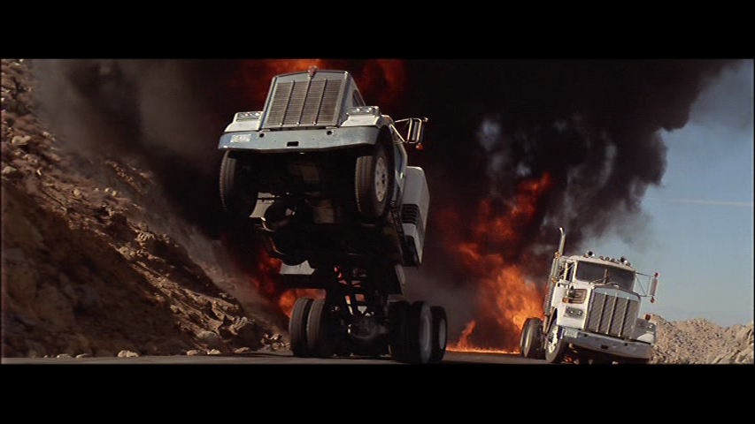 Licence-to-Kill-Kenworth-truck-wheelie.png