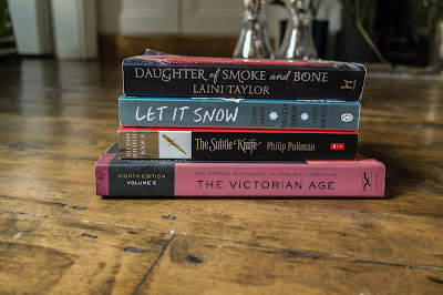 October book haul featuring a stack of books 