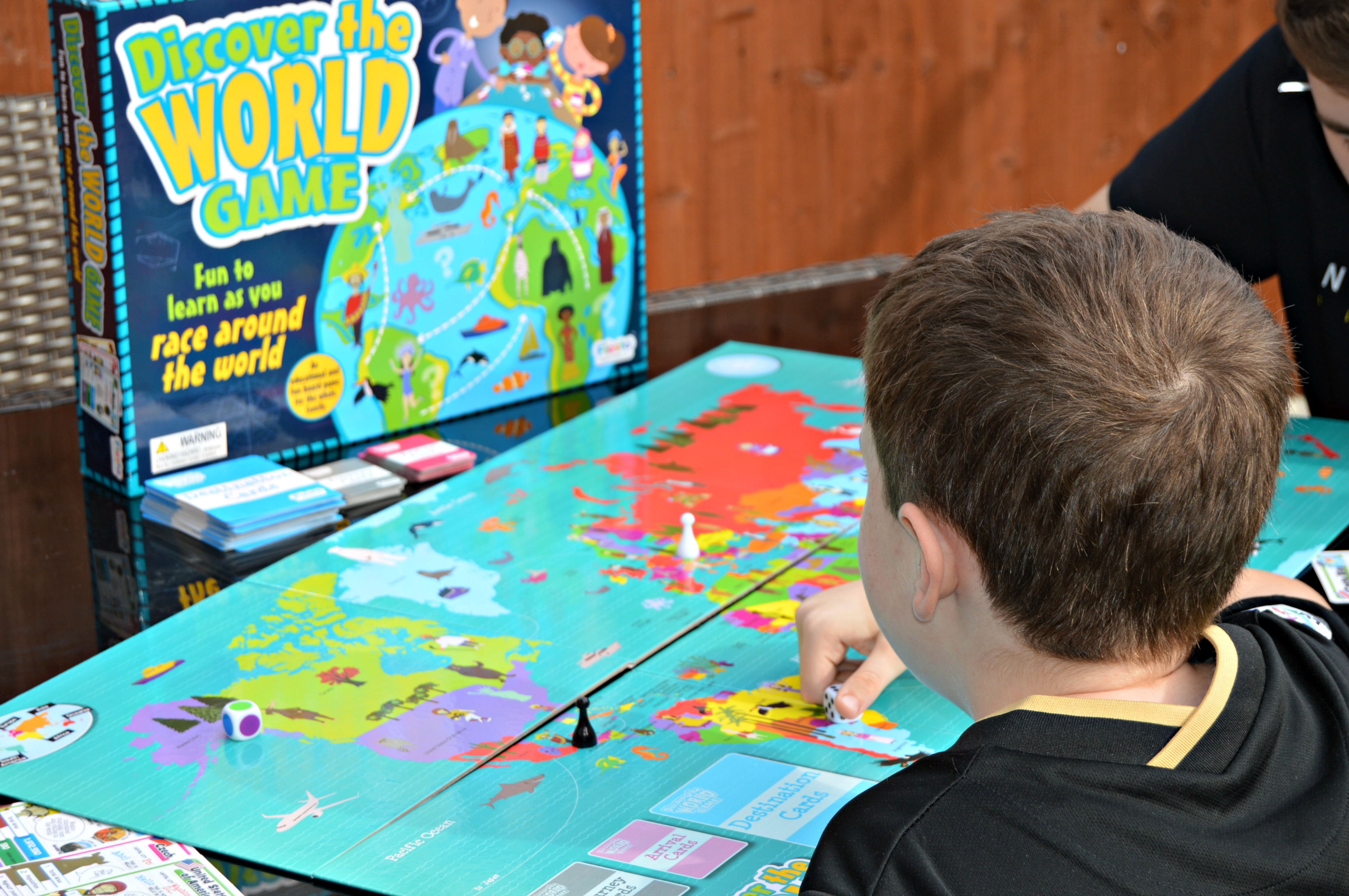 Boys playing Discover The World Game