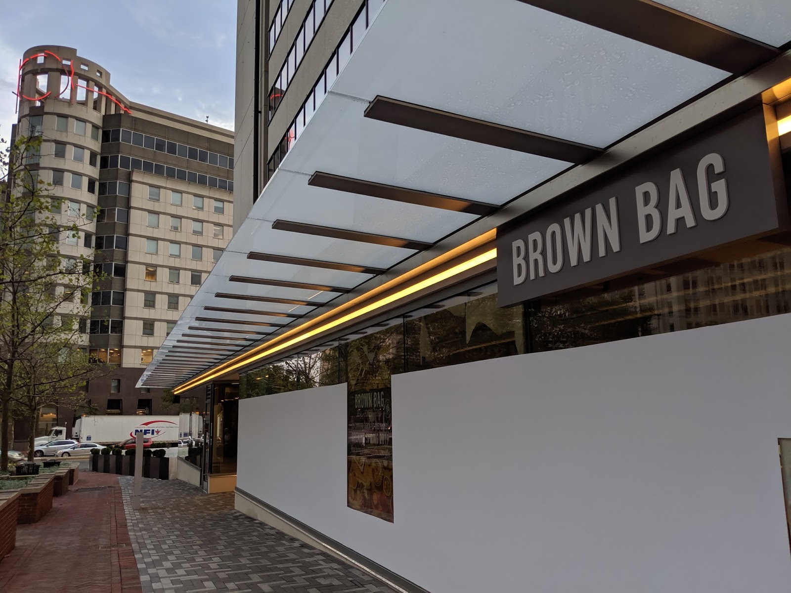 Robert Dyer Bethesda Row Sign installed at Brown Bag in Bethesda