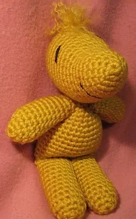 http://www.ravelry.com/patterns/library/crocheted-woodstock-lookalike-amigurumi