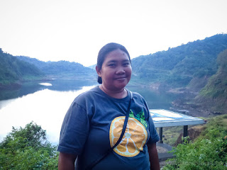 Woman Traveler And Natural Landscape Of Titab Ularan Dams Reservoir Scenery In The Cloudy Sky After Rain