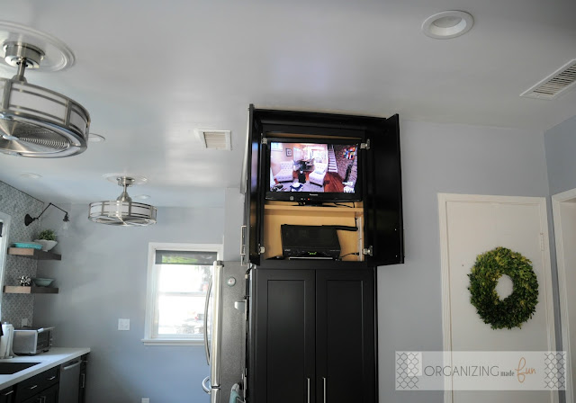 TV hidden behind cabinet doors :: OrganizingMadeFun.com