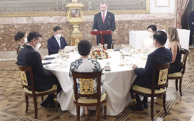 Queen Letizia wore a sequin embellished metallic floral print jacquard midi dress from Dries van Noten. First Lady Kim Jung-sook