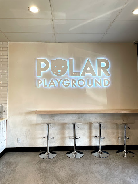 Visiting Polar Playground in Huntington Beach, California and eating oversized Baby Yoda cotton candy.