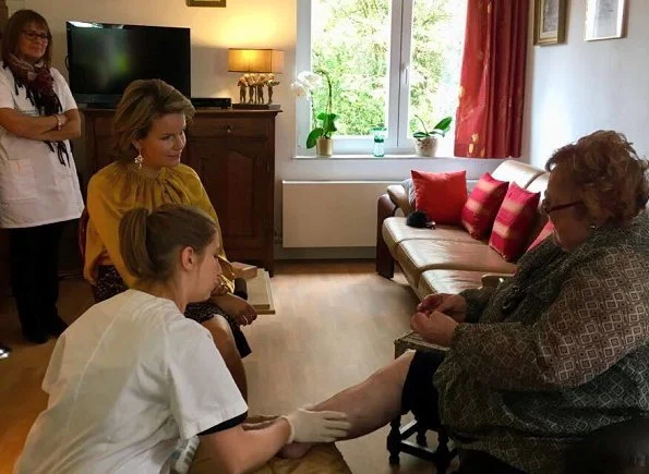 Queen Mathilde of Belgium visited ASD (Aide et soins a domicile) Home Care Center in Jambes, Namur. Natan Dress