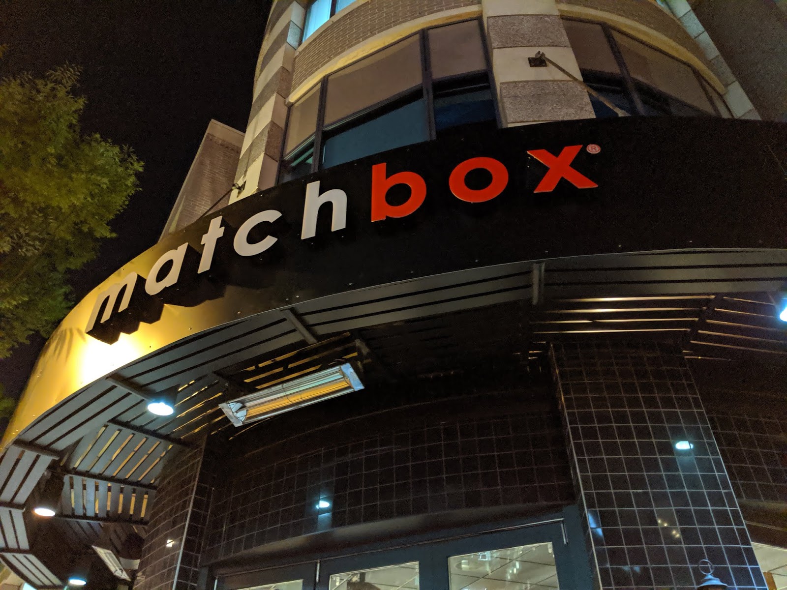 Robert Dyer Bethesda Row Matchbox sign installed at Bethesda Row