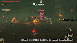 Link fighting a Guardian above the dock of Hyrule Castle
