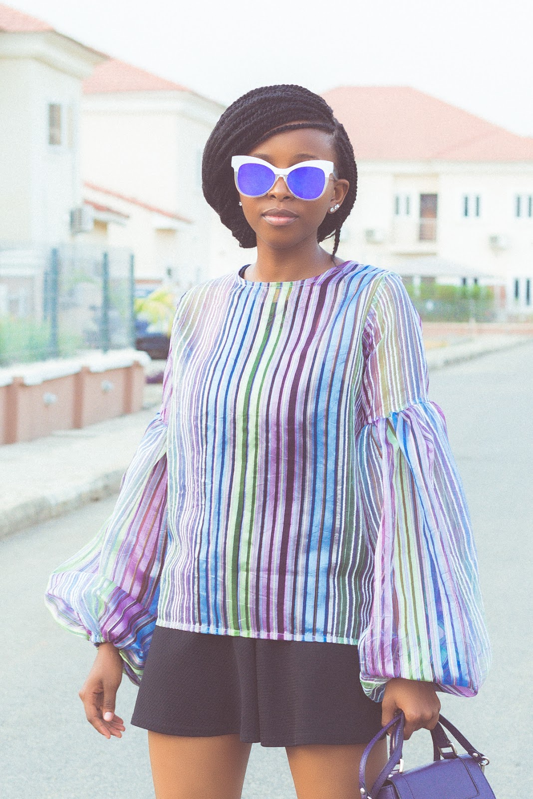 Abuja-based fashion blogger, Oroma Roxella Rukevwe (of www.orrblog.net) styling a Fashpa organza top.