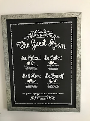 Close-up of "The Guest Room" print from Hobby Lobby