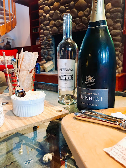 Henriot Brut with a cheese plate. Photo by Nicole Ruiz Hudson
