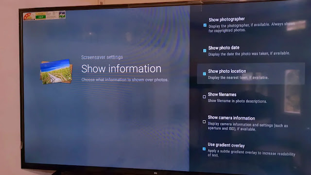show location , photo details etc on screensaver images show photographer option on screensaver images