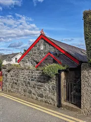 Stone house with red trim in Carlingford Town Ireland