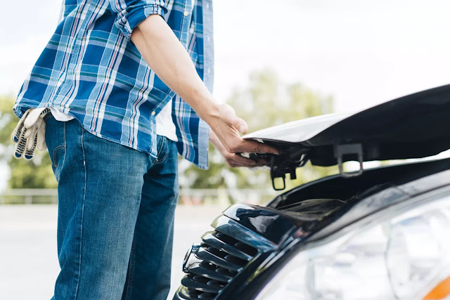 Comment fermer le capot d%2527une voiture