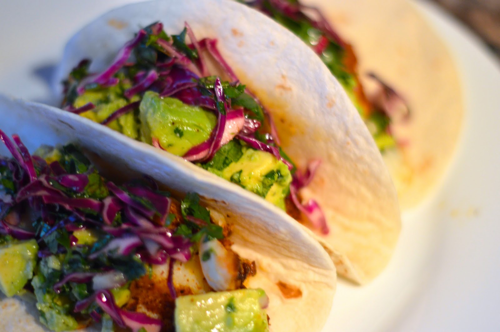 Blackened Fish Tacos with Chunky Guacamole and Cabbage Cilantro Slaw