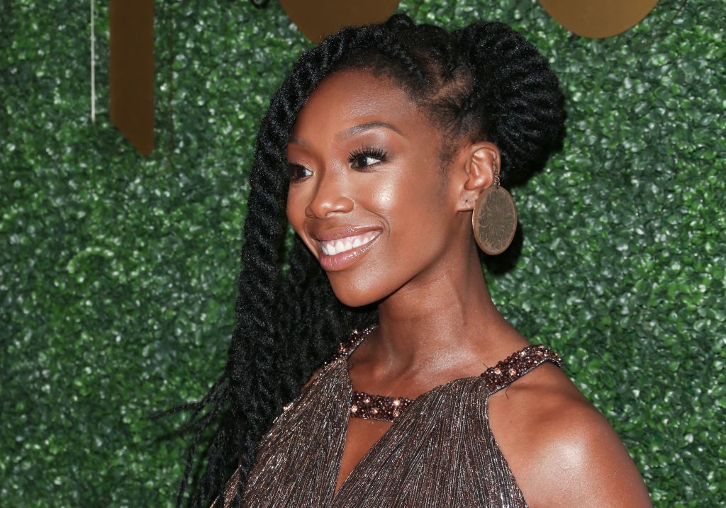 ABOUT BRANDY NORWOOD "AMERICA SELFDEVELOPMENT EXECUTIVE, SINGER