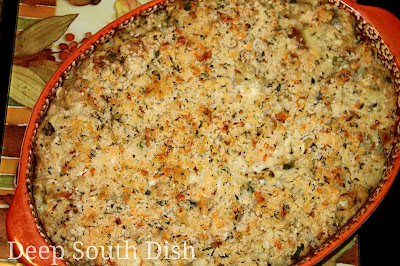 Seafood and Eggplant Dressing, a breaded seafood dressing, sometimes referred to as a casserole, made with fresh shrimp, crabmeat and eggplant.