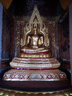 Gold Buddha Wall Sculpture as The Worship Place at Brahmavihara Arama Monastery North Bali