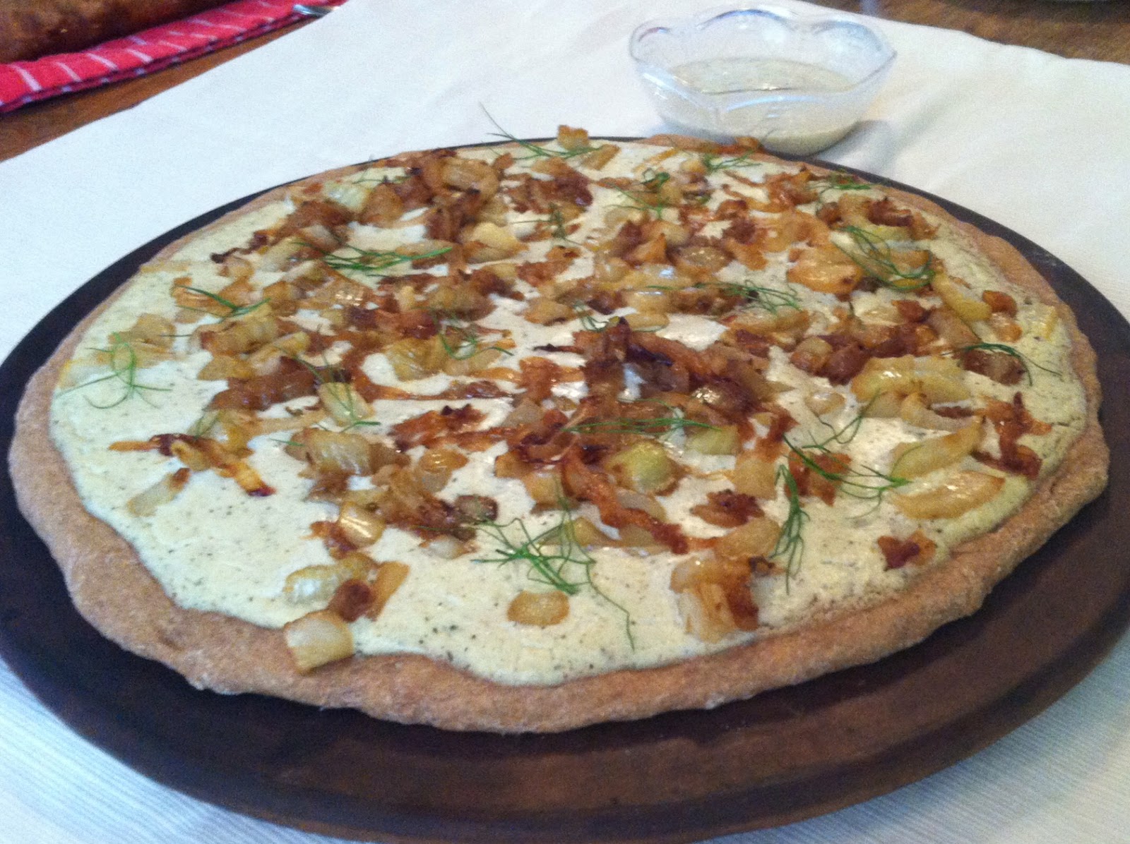 An Officer and A Vegan Vegan Alfredo Pizza with Caramelized Onion, Garlic, and Fennel