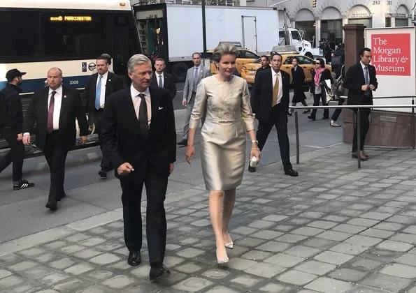 Queen Mathilde wore GIORGIO ARMANI Duster Coat, and Natan dress. Belgian fashion brand. Queen visited Morgan Library and Museum in New York