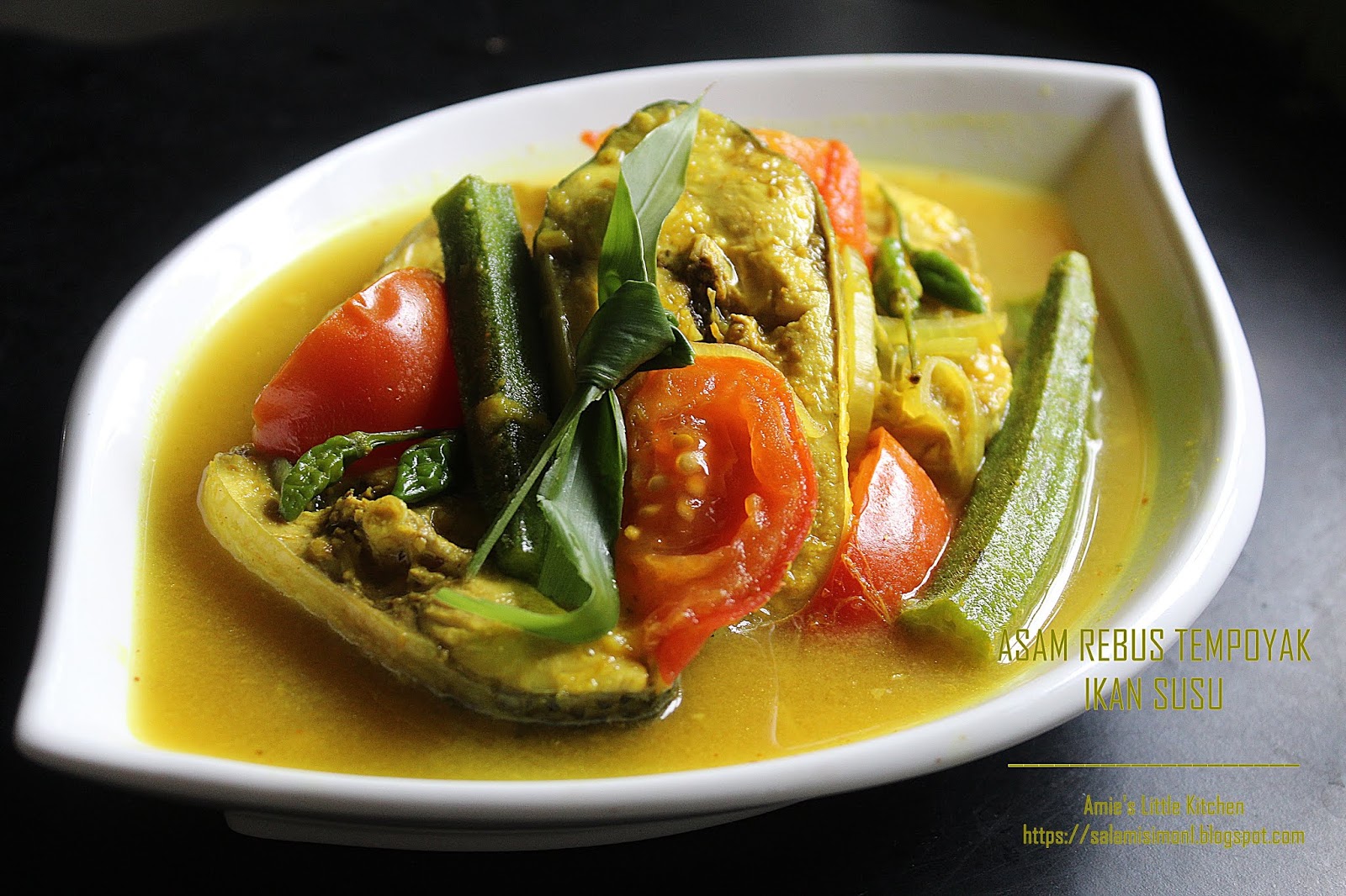 Cara Masak Asam Rebus Tempoyak Ikan Susu yang Sedap