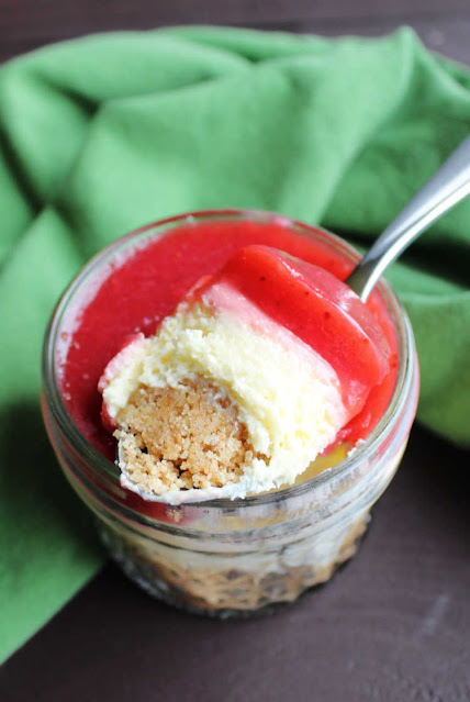 Mini sweetened condensed milk cheesecakes have all of the rich creamy goodness of our favorite baked cheesecake made quick and easy in individual sized jars. spoonful of cheesecake ready to eat