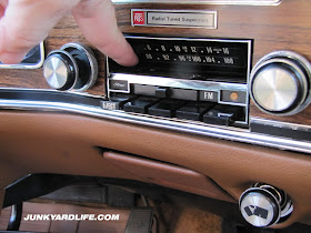 Radial Tuned Suspension emblem is mounted above the radio.