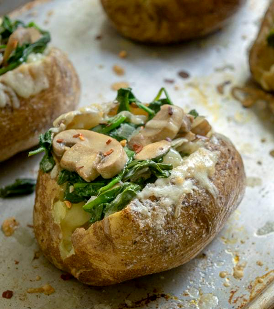Cheesy Vegetarian Loaded Baked Potatoes with Spinach and Mushrooms Recipe