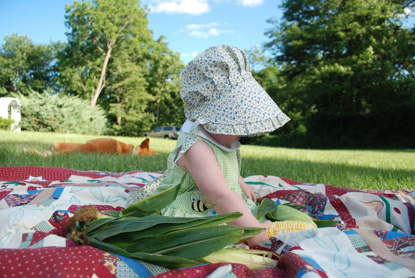 Sarah Smiles Shucking corn for Grandma