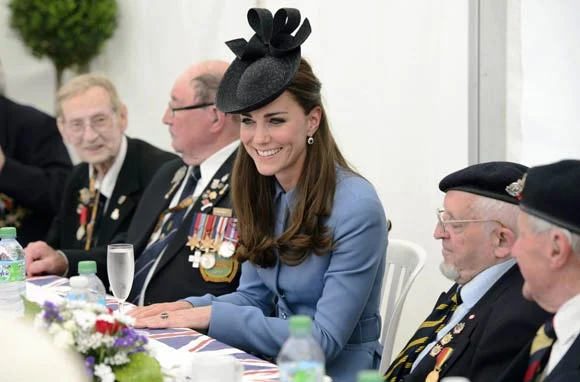 The Duke and Duchess stopped before attending the tea party to look across the historic Gold Beach in Arromanches 