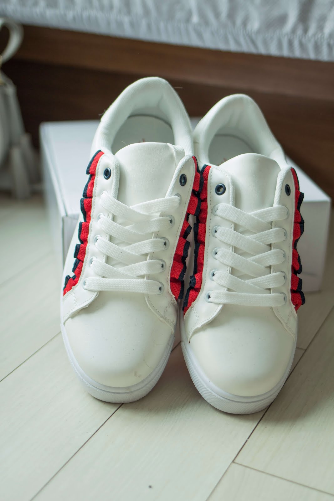 white dupe trainers red blue frill trim