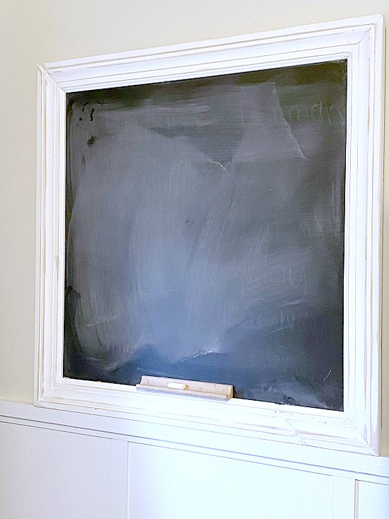 Wall chalkboard with white frame