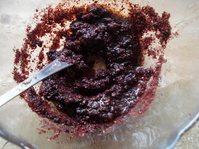 Make a paste with the sumac and olive oil.