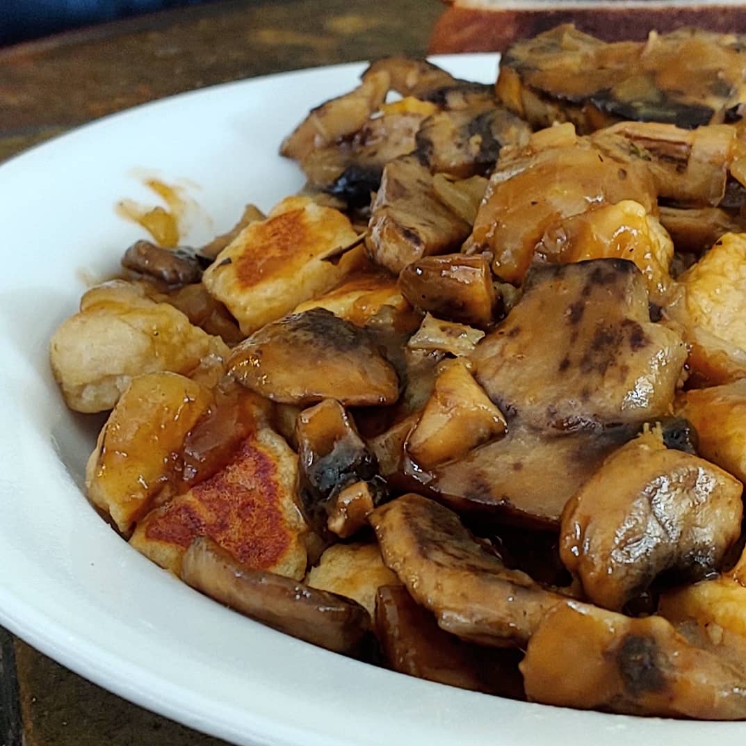 Gnocchi with Caramelized Onion, Duck and Mushroom Gravy What Smells