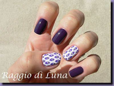 Raggio di Luna Nails: Purple peacock design manicure