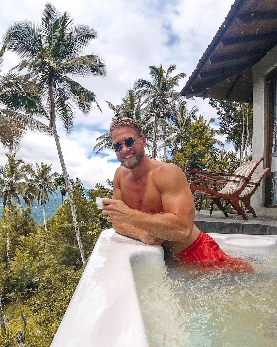 blond-bearded-shirtless-buff-daddy-sunglasses-jacuzzi-hot-tub