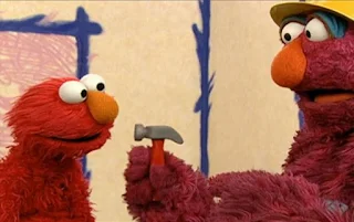 Telly reappears saying it's hammer time. Elmo asks him what he's building. Sesame Street Elmo's World Building Things