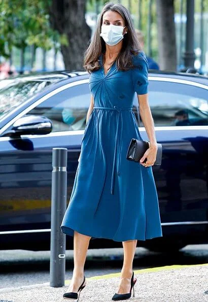 Queen Letizia wore a v-neck embroidered crepe dress from Bottega Veneta, and slingback black pumps from Carolina Herrera