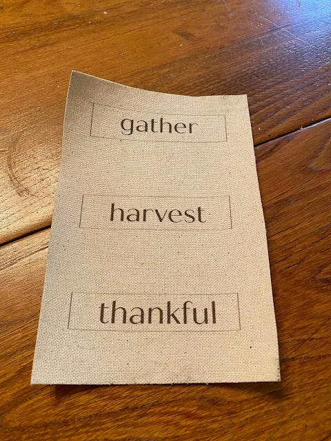 Photo of muslin labels with fall words.
