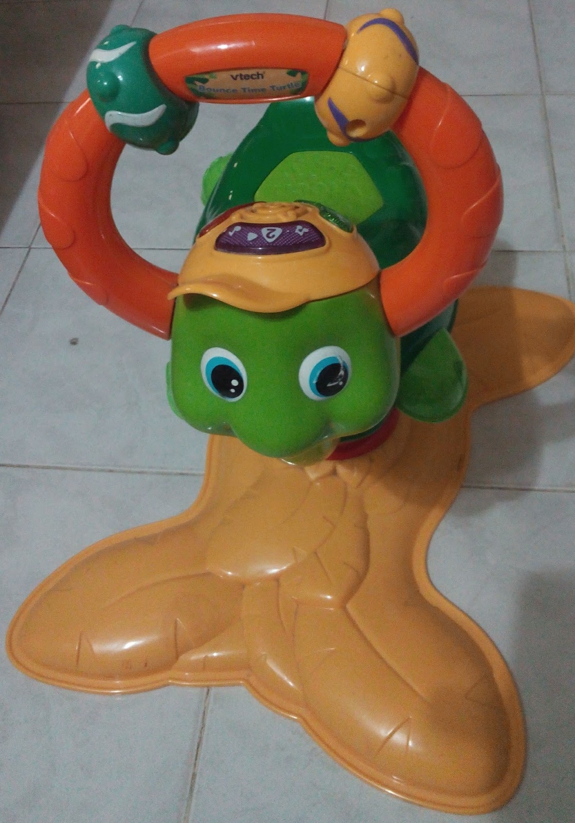 TenderLovingCare Toys: Vtech Bouncing Turtle with Music & Lights (used)