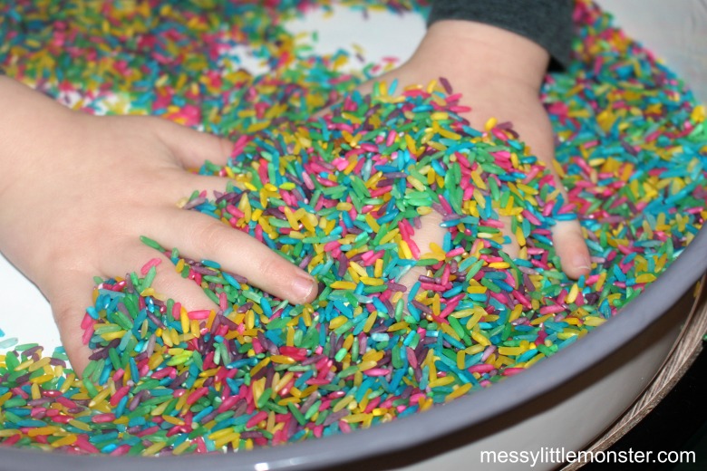 Rainbow rice sensory bin for toddlers and preschoolers.