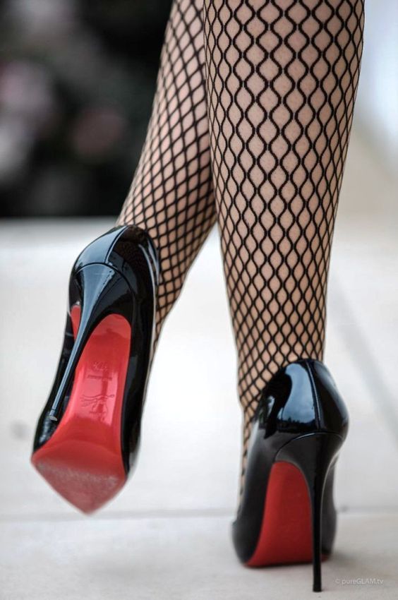 Black fishnet stockings and heels